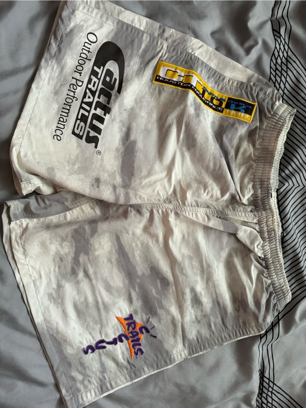 Travis Scott White Athletic Shorts with Purple and Gold Accents